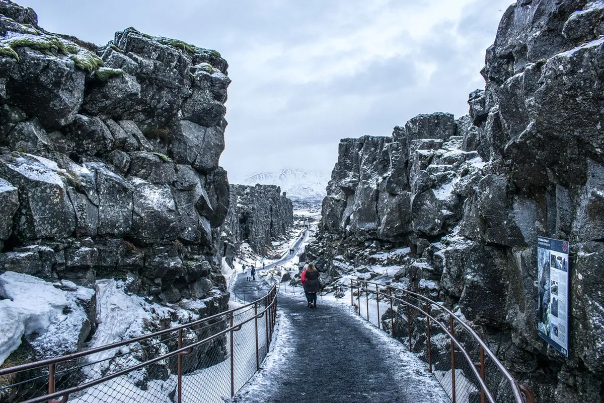 The path descending in between the two tectonic plates in Thingvellir National Park in Iceland
