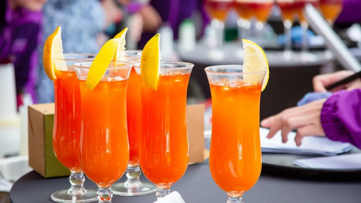 Cocktails being served on the top deck on an Ambassador cruise