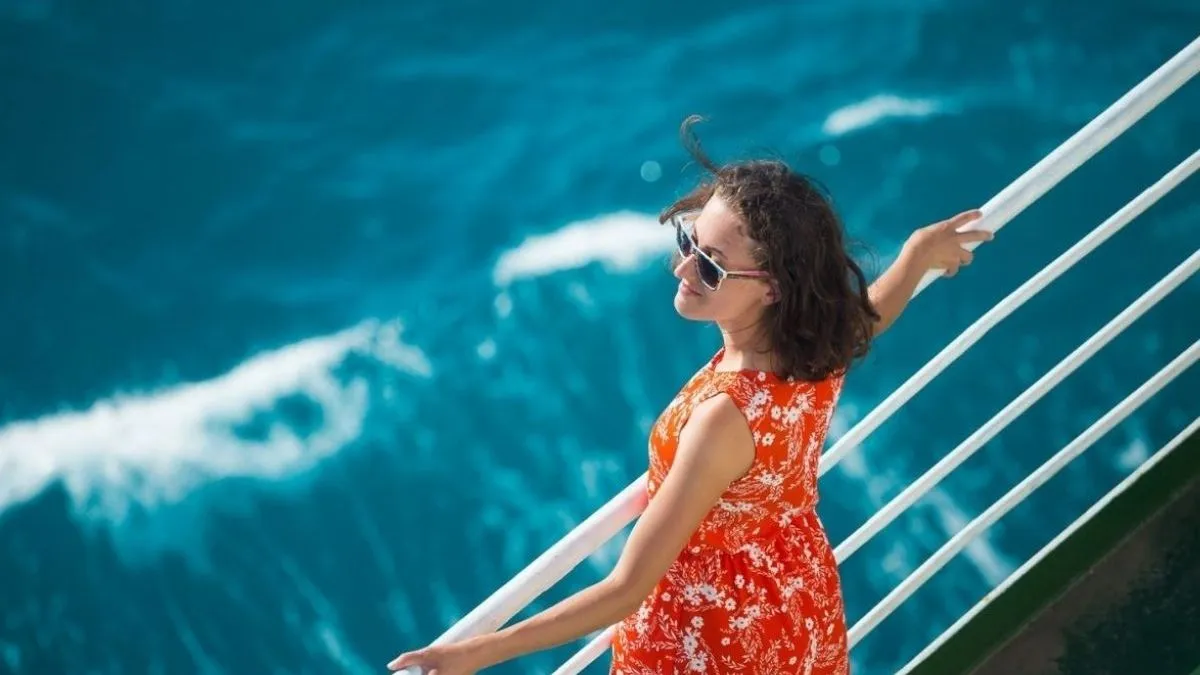 Person looking out to sea on ship