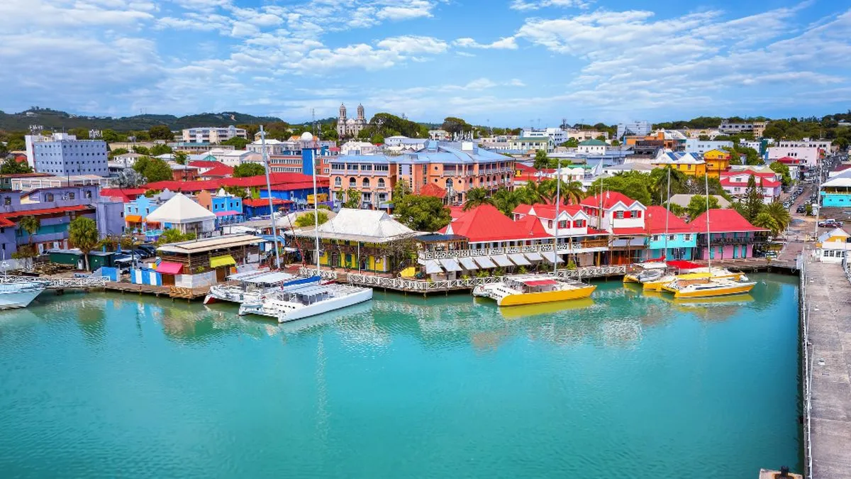 View of the blue waters and red-roof houses in the Caribbean