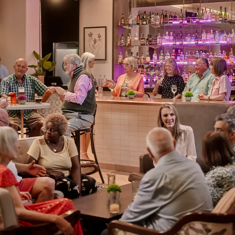 Solo guests meeting at a hosted social on board Ambassador