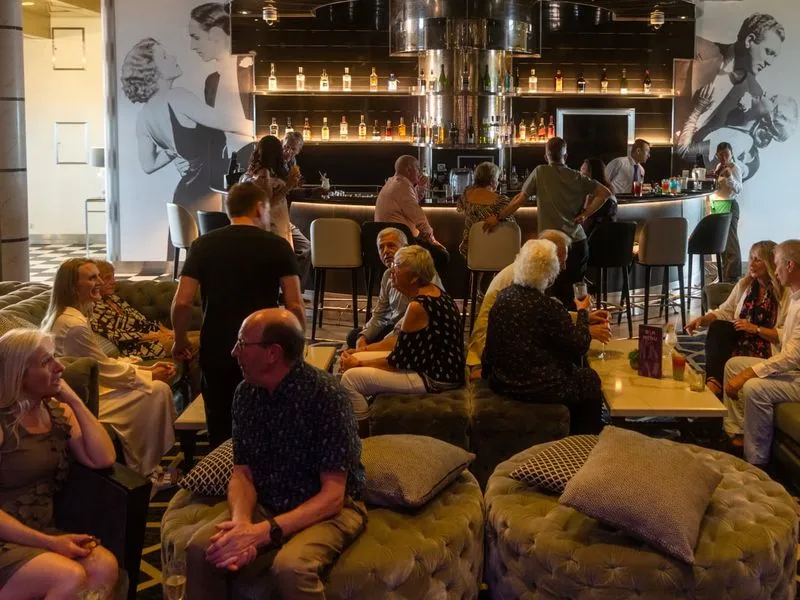 Groups of people socialising in Raffle bar