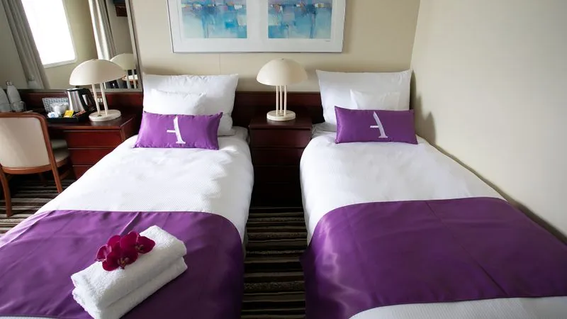 Twin Oceanview cabin aboard Ambience by Ambassador Cruise Line